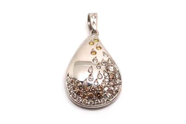Coloured diamonds set in tear drop settings on a white gold pendant