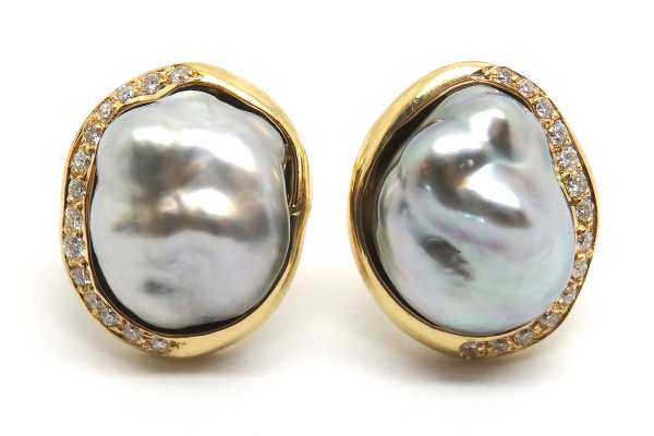 Keisha natural black pearls set with a gold and diamond spray stud earrings