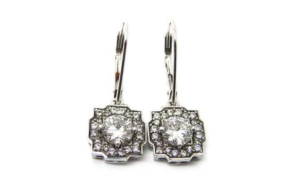 Diamond claw set with surrounding smalls in an art deco design hinged earrings