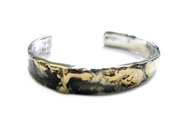 Mens cuff with  gold melted into to sterling silver with blackened finish