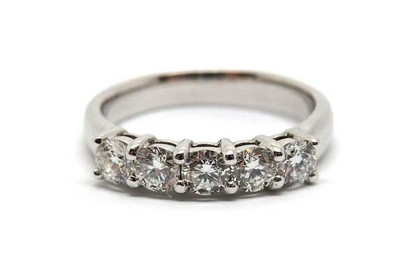 Shared claw brilliant cut diamond ring