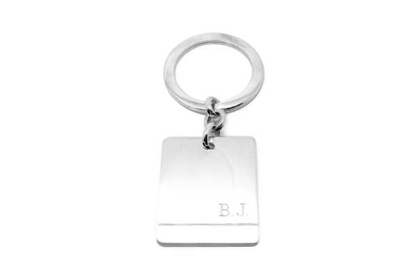 A hand carved keyring with hand engraved initials