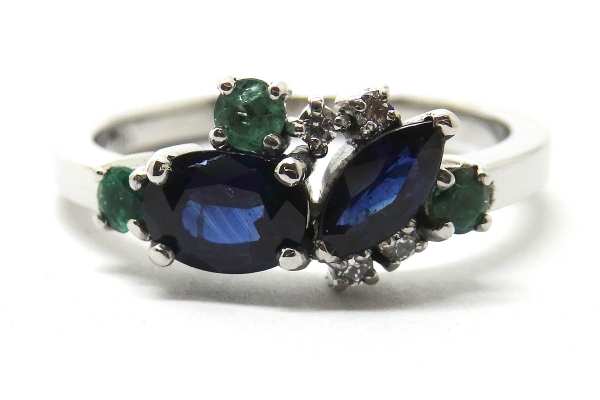 Sapphire emeralds and diamond claw set dress ring