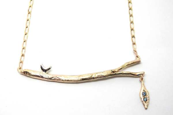 Hand forged branch with stylised bird and leaf pendant