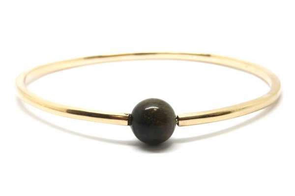 Opening gold bangle with gold obsidian bead
