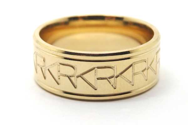 Personalised wedding ring with couples initial’s creating the pattern