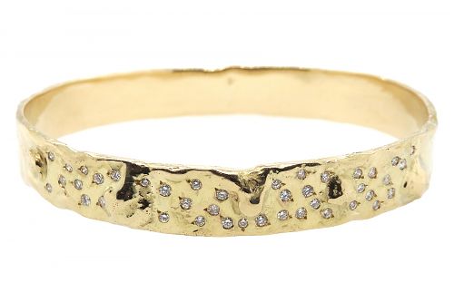 Handmade 18ct yellow gold bangle with and oval profile and melted section. A selection of 40 diamonds bead set across the top.