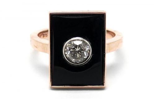 Onyx dress ring with a centre bezel set diamond dress ring