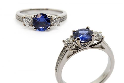 Ceylon sapphire and diamond engagement ring with diamond side stones and in the band