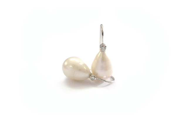 Pear shaped pearl with brilliant cut round diamonds bezel set hook earrings