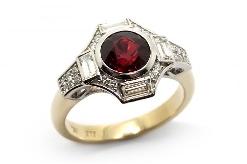 Natural ruby bezel set with a diamond Art Deco inspired surround