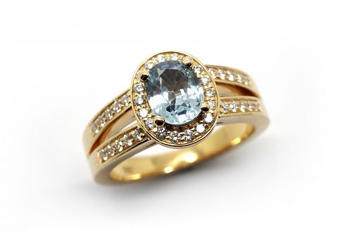 Aquamarine with a diamond halo and diamond split band ring