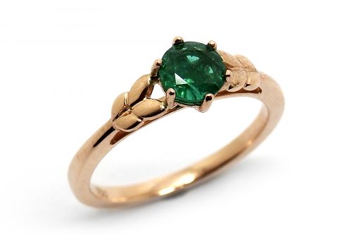 Natural emerald with a leaf design in rose gold