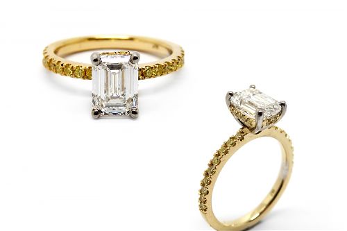Emerald cut diamond solitaire with a yellow diamond halo and encrusted band