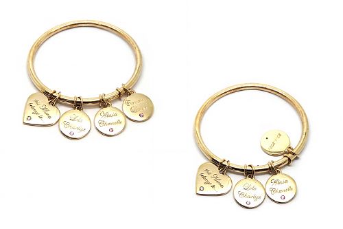 A beautiful family bangles Solid gold with handmade discs, each grandchild’s name and birthdate, and coloured sapphire