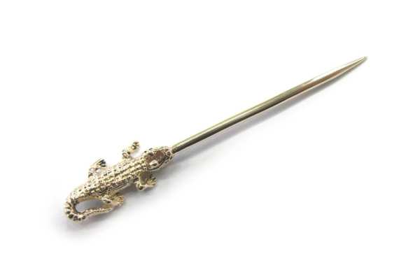 Gold toothpick with figurine handle