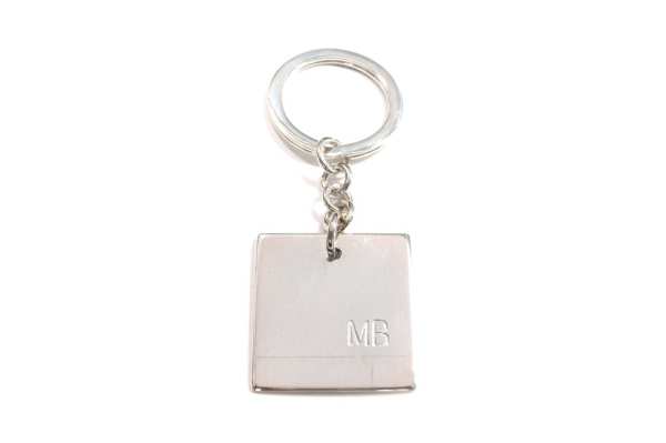 Hand engraved initials on plate key ring 